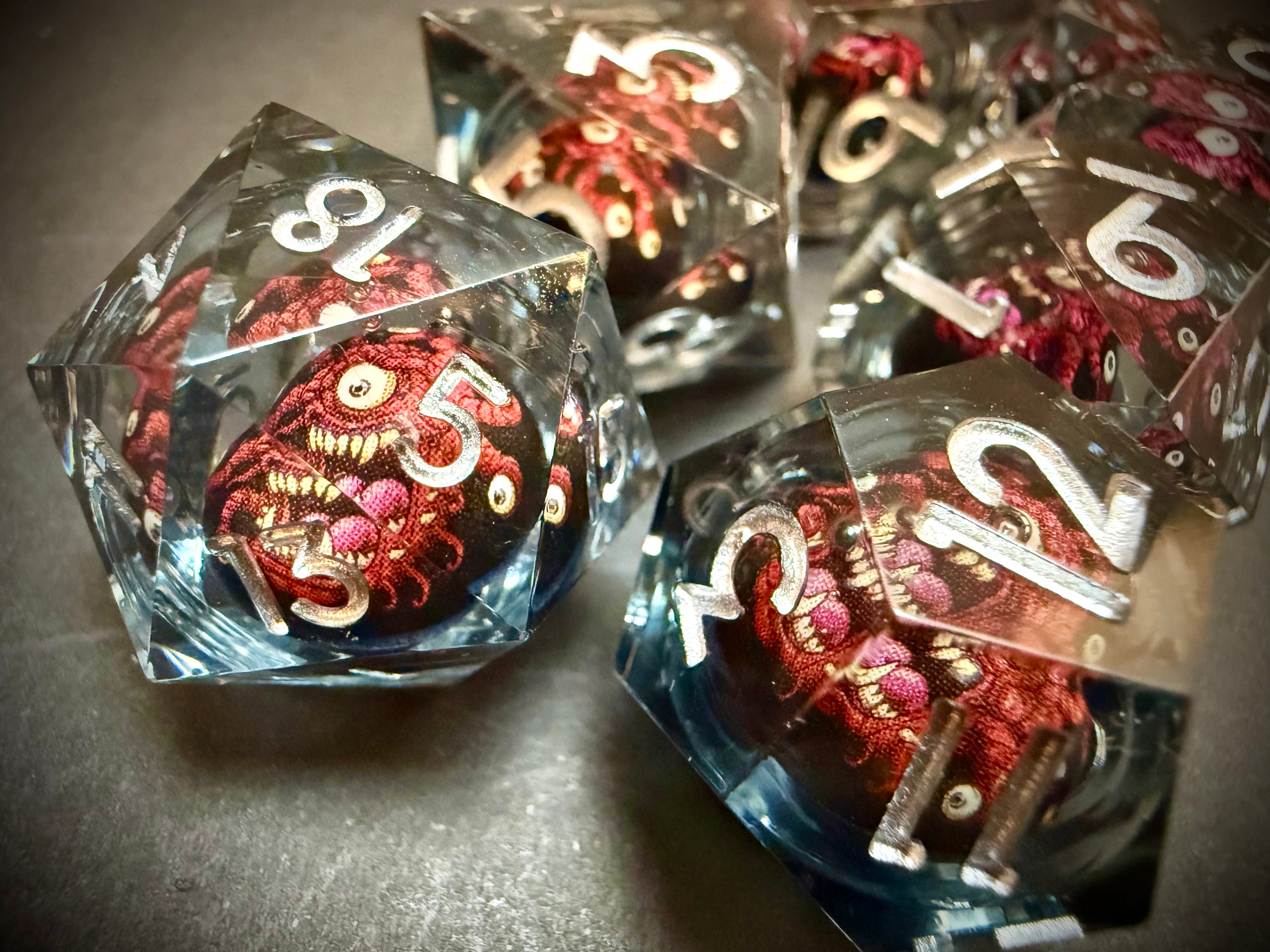 Red Beholder Rotating Core Resin Dice Set