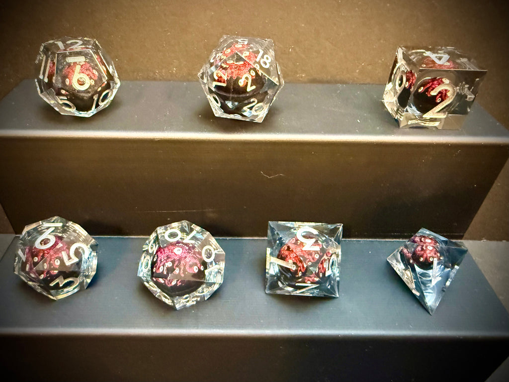 Red Beholder Rotating Core Resin Dice Set