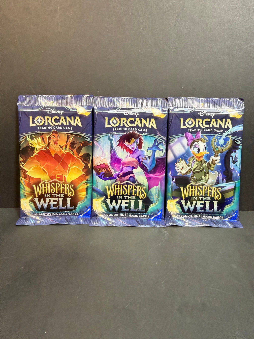 Disney Lorcana Whispers in the Well Booster Pack