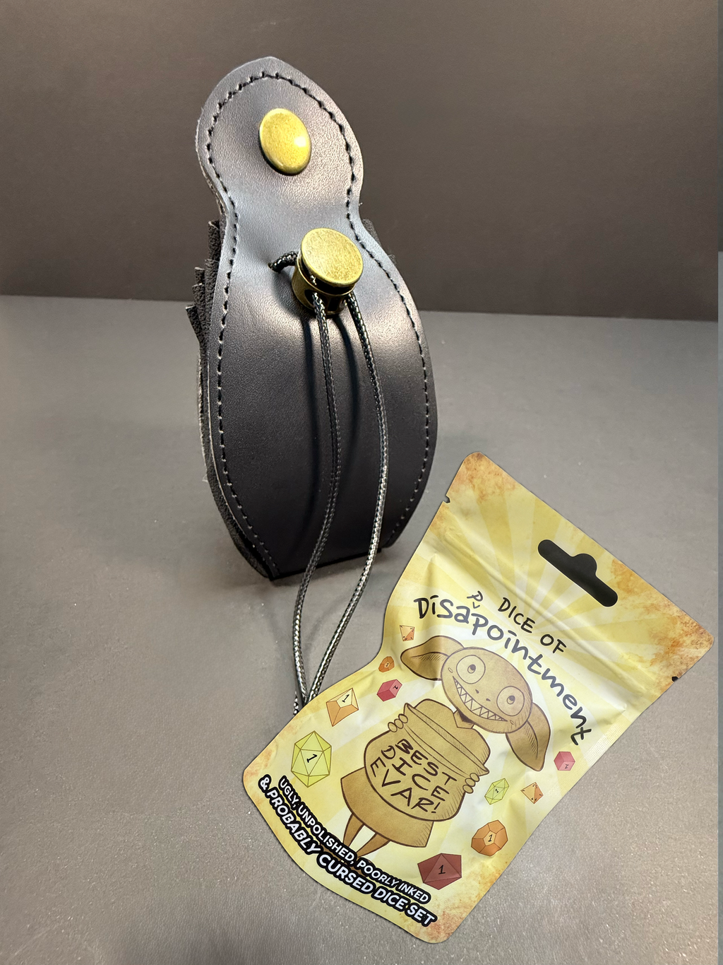 Mystery Goblin Dice of Disappointment & Black Faux Leather Dice Bag Bundle