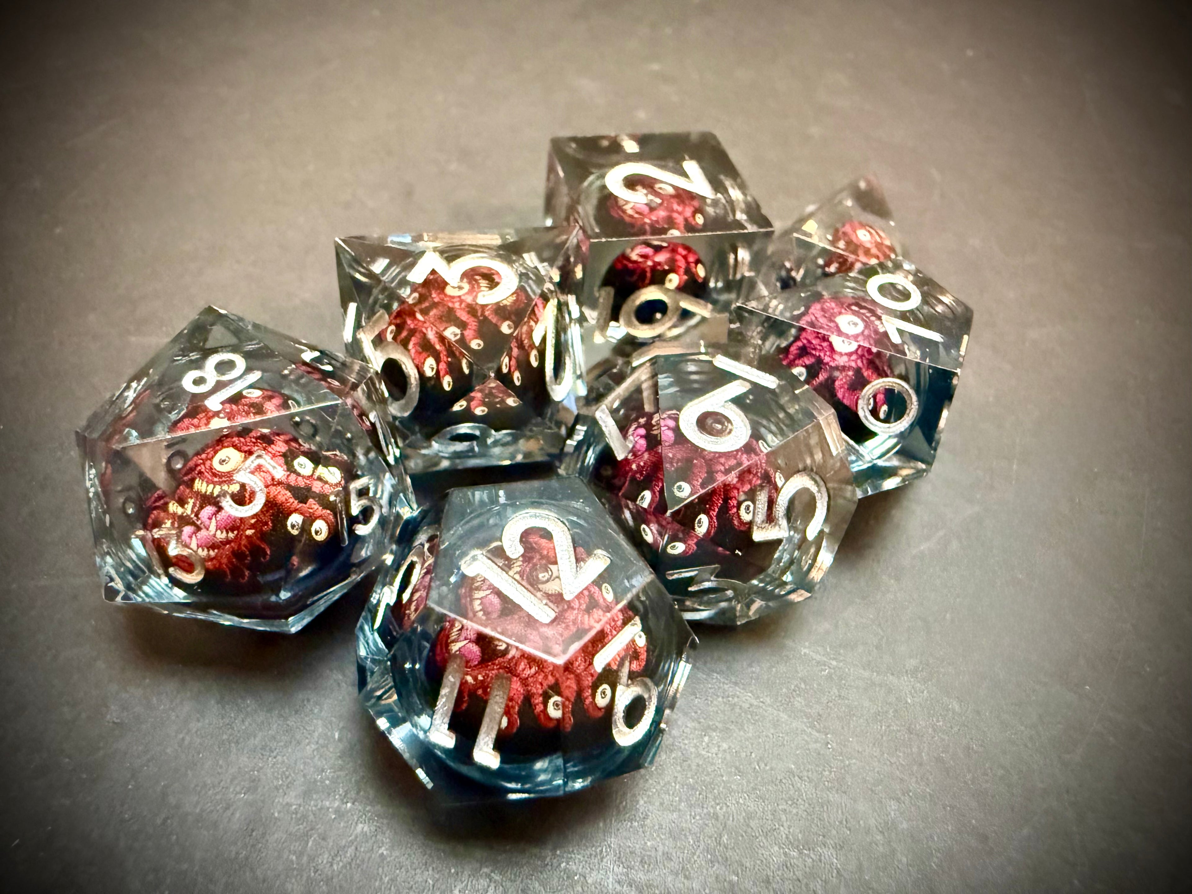 Red Beholder Rotating Core Resin Dice Set
